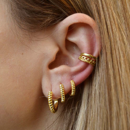 Boucles d'oreilles triple chaîne en argent 925 plaquées en or 18 carats.